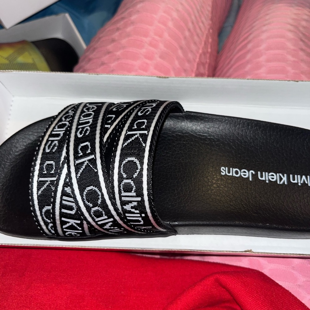 Brand new. 2pair of Calvin Klein slide